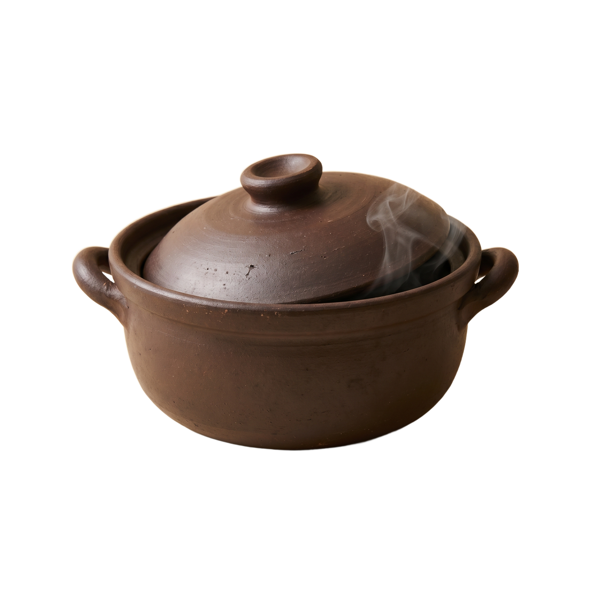 A Hakka clay cooking pot, lit by soft daylight